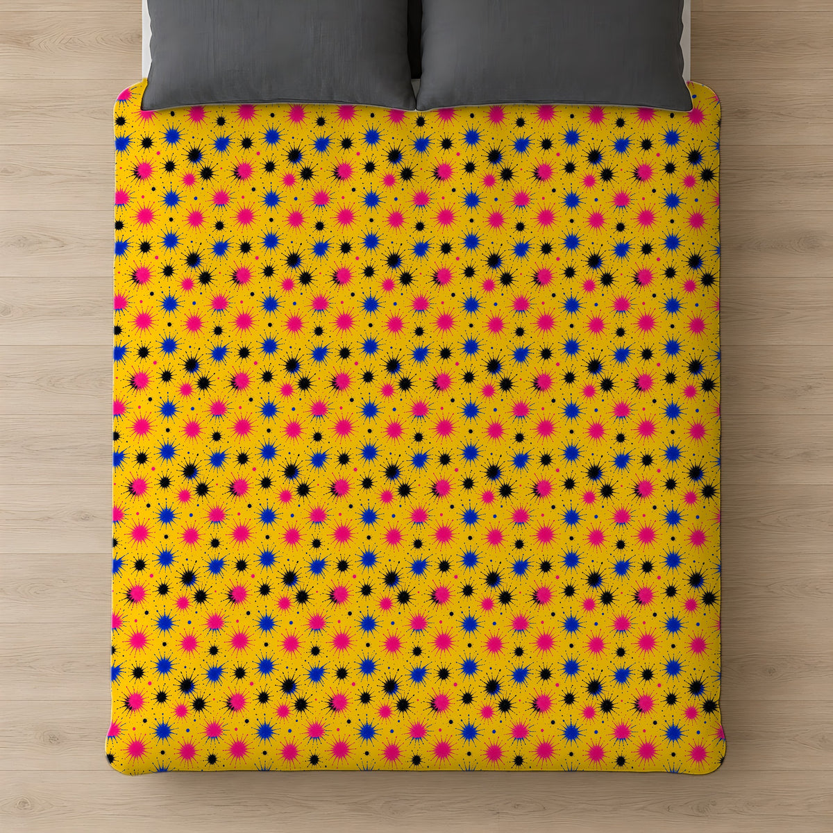 Splash Crowns Cotton Duvet Cover on a bed, seen from above
