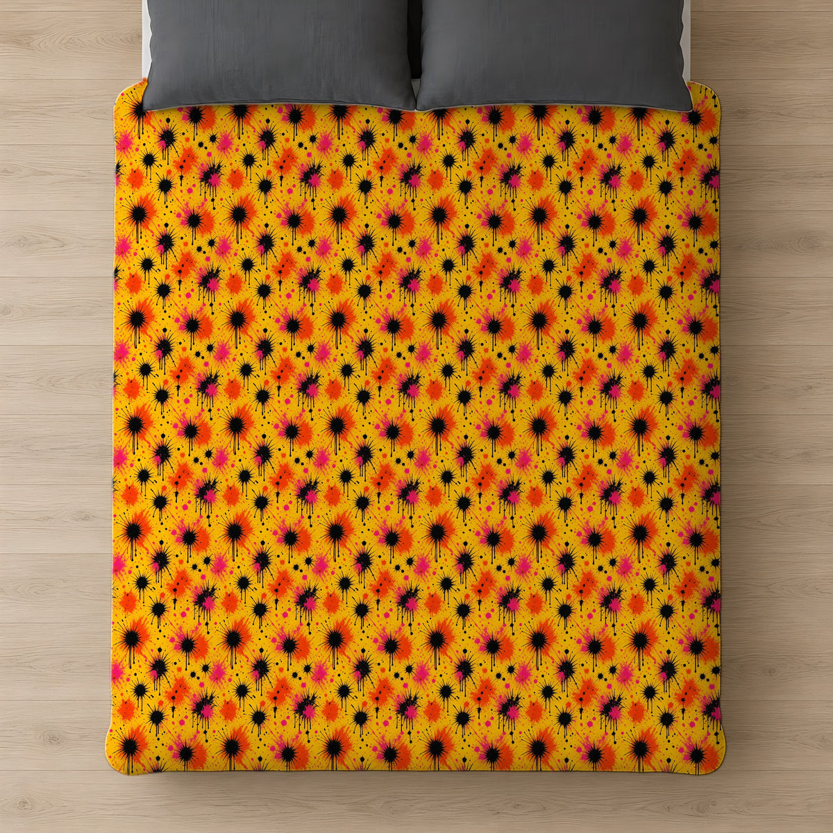 Black Ink Burst Cotton Duvet Cover on a bed, seen from above