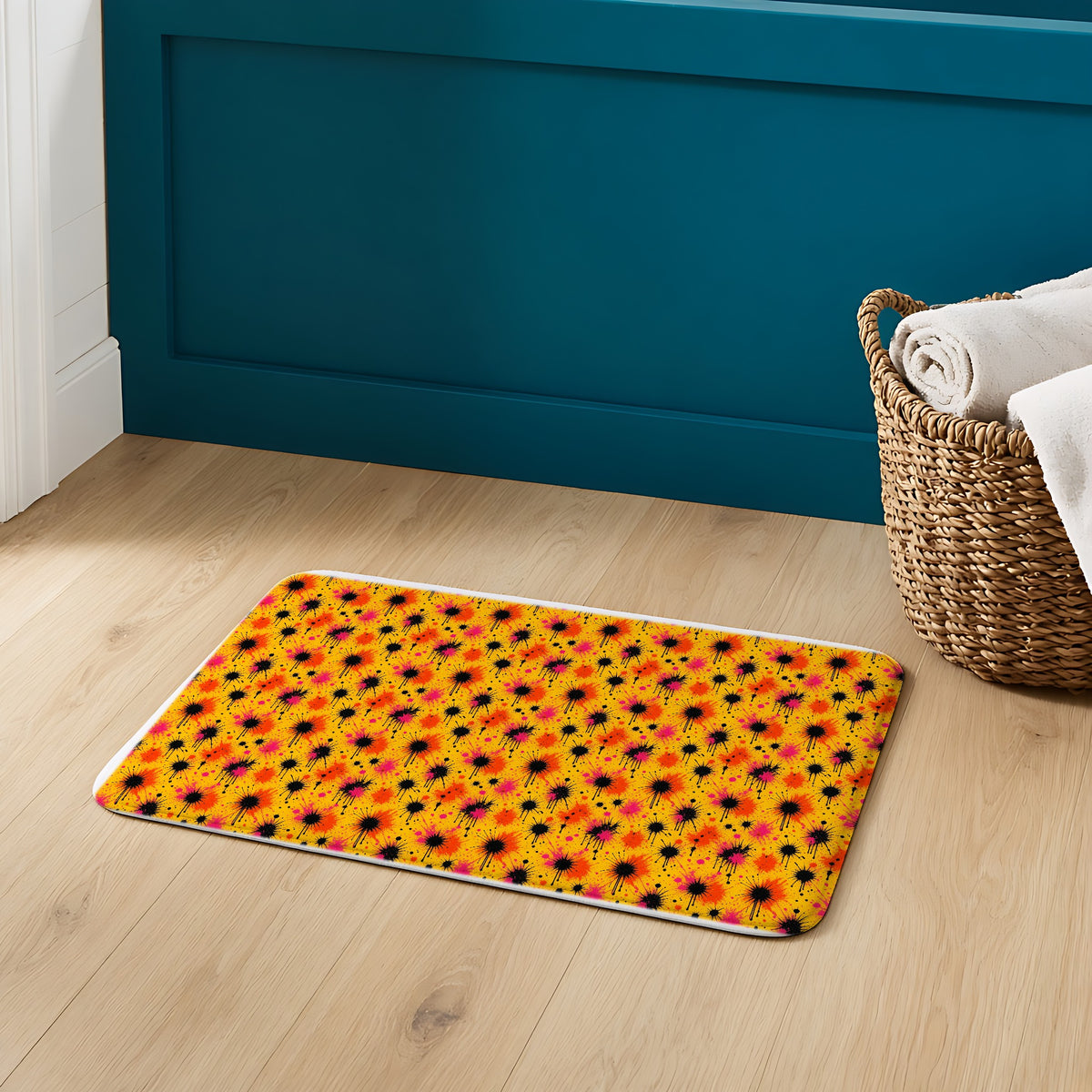 Black Ink Burst Bath Mat on an oak floor in a teal bathroom