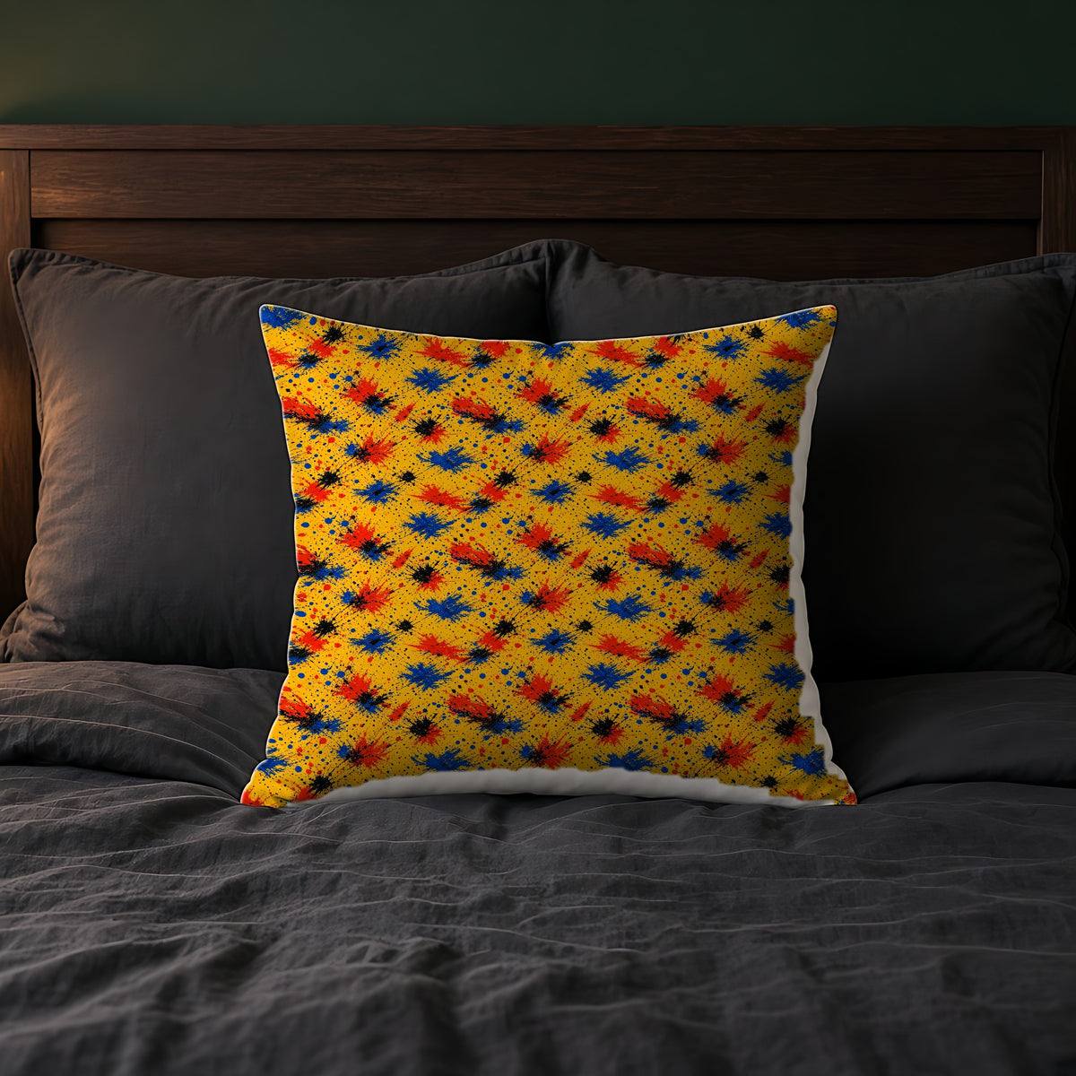 Dragged Smears Faux Suede Cushion on a bed with charcoal bedding