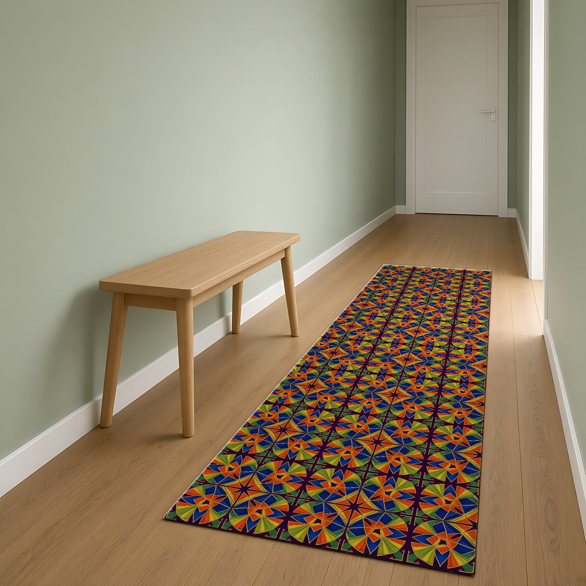 Kaleido Fan Quatrefoil Outdoor Rug as a runner in a sage-green hallway