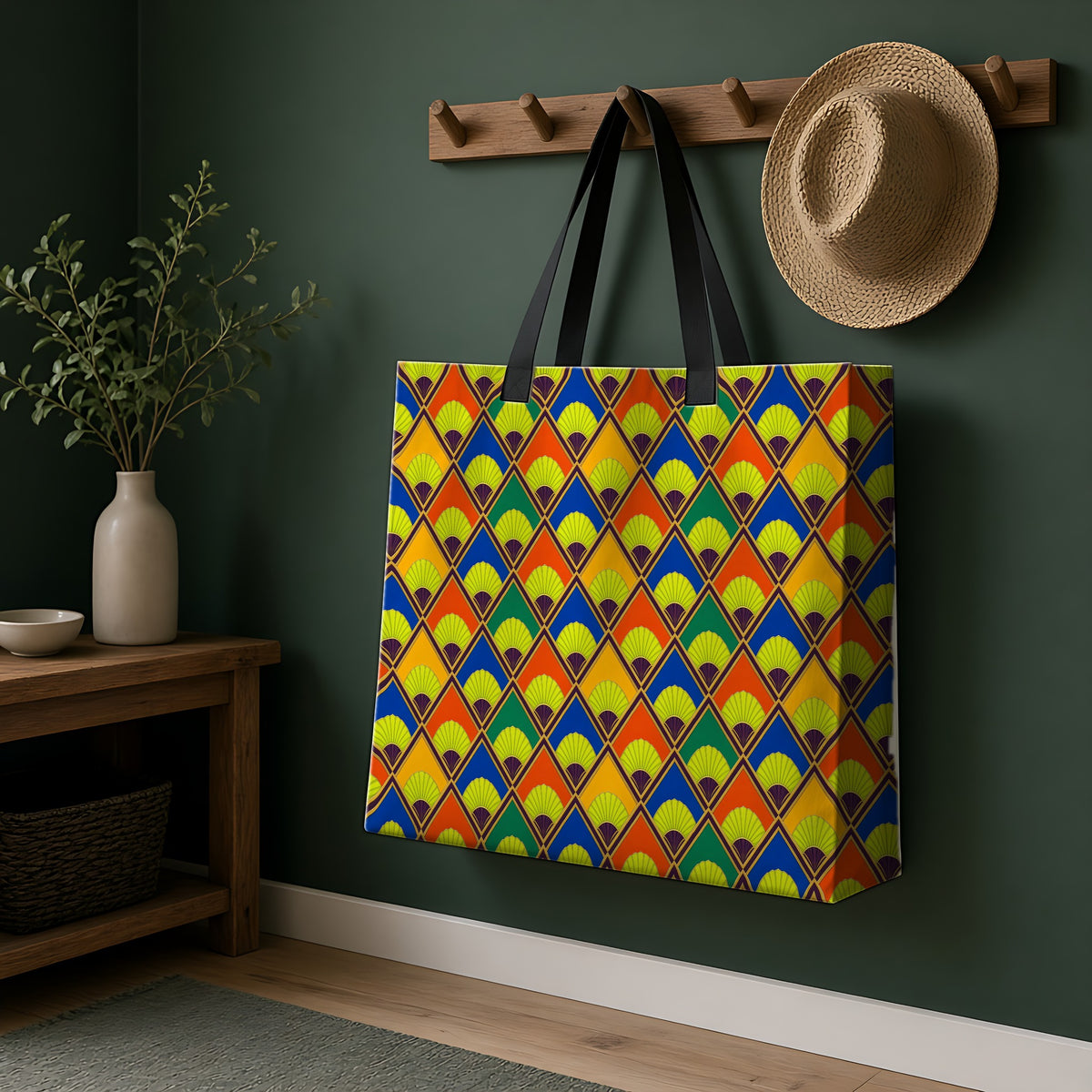 Fanfare Harlequin Weekender Tote Bag hanging on a peg rail in a green hallway