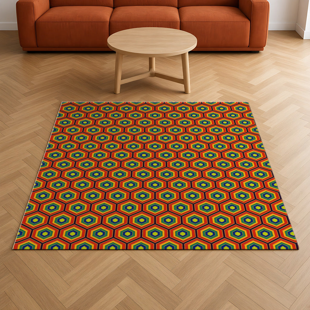 Hexagon Enamel Nest Outdoor Rug on a herringbone wood floor in a living room