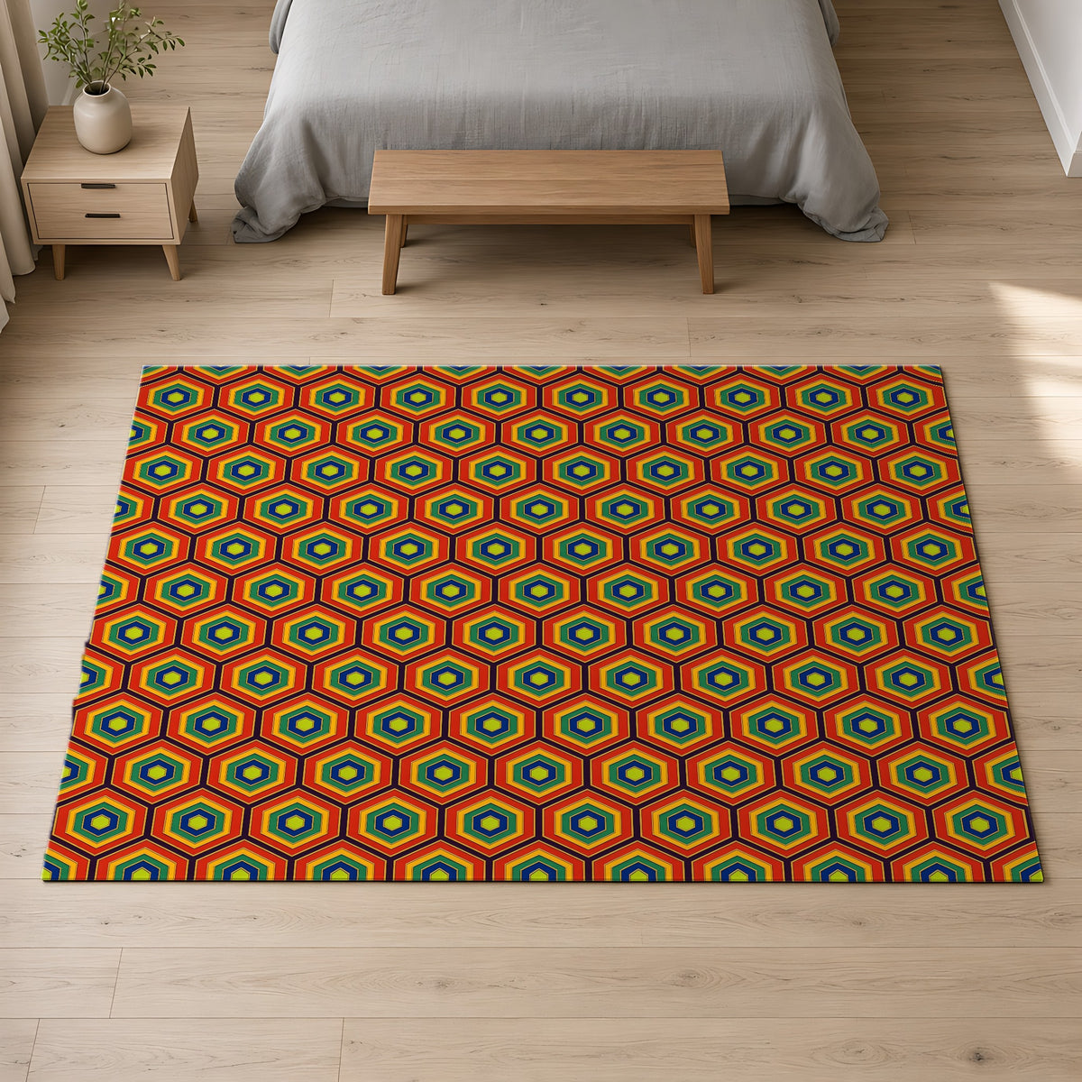 Hexagon Enamel Nest Outdoor Rug on a pale oak floor in a calm bedroom