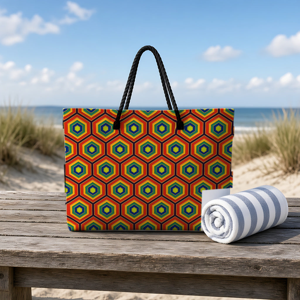 Hexagon Enamel Nest Weekender Tote Bag on a rustic table by the beach