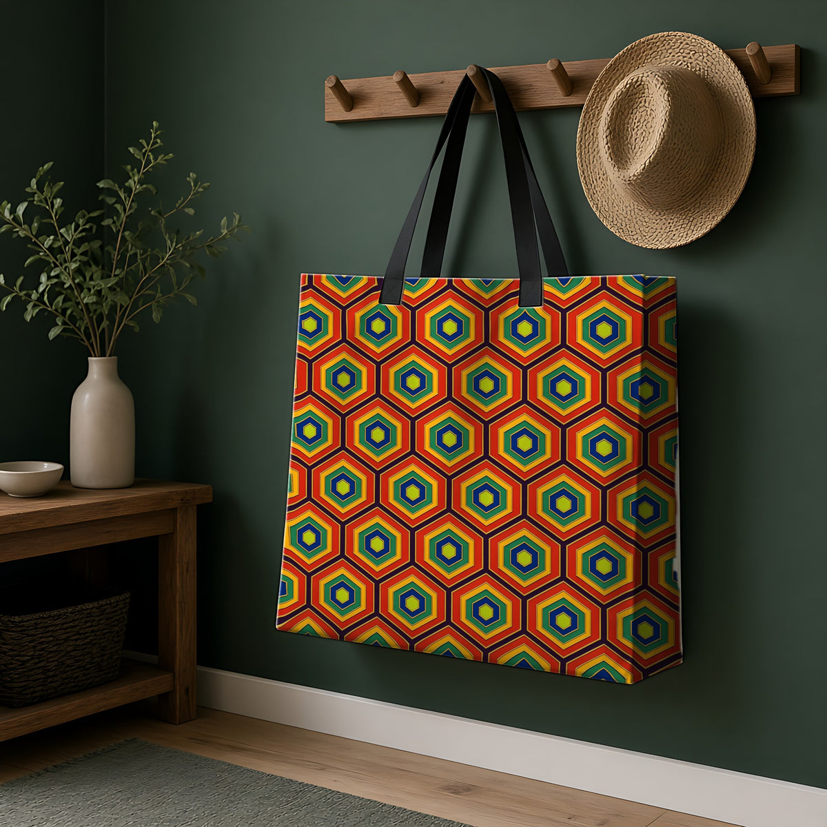 Hexagon Enamel Nest Weekender Tote Bag hanging on a peg rail in a green hallway