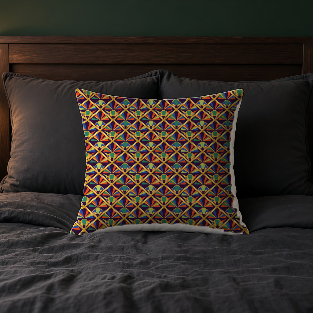 Gilded Lattice Sunburst Faux Suede Cushion on a bed with charcoal bedding