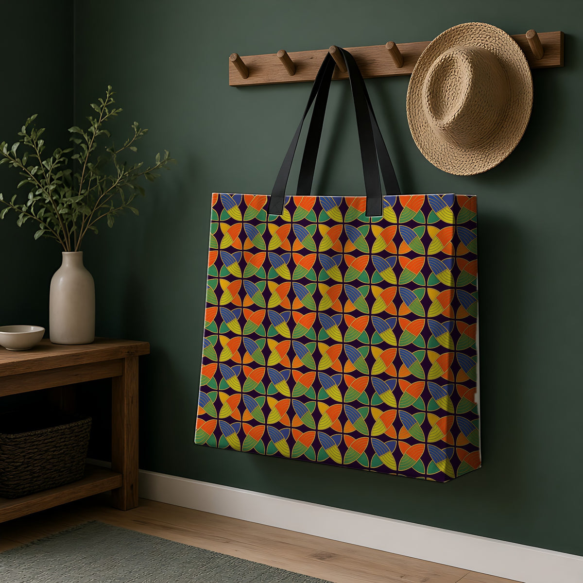 Woven Petal Quatrefoil Weekender Tote Bag hanging on a peg rail in a green hallway