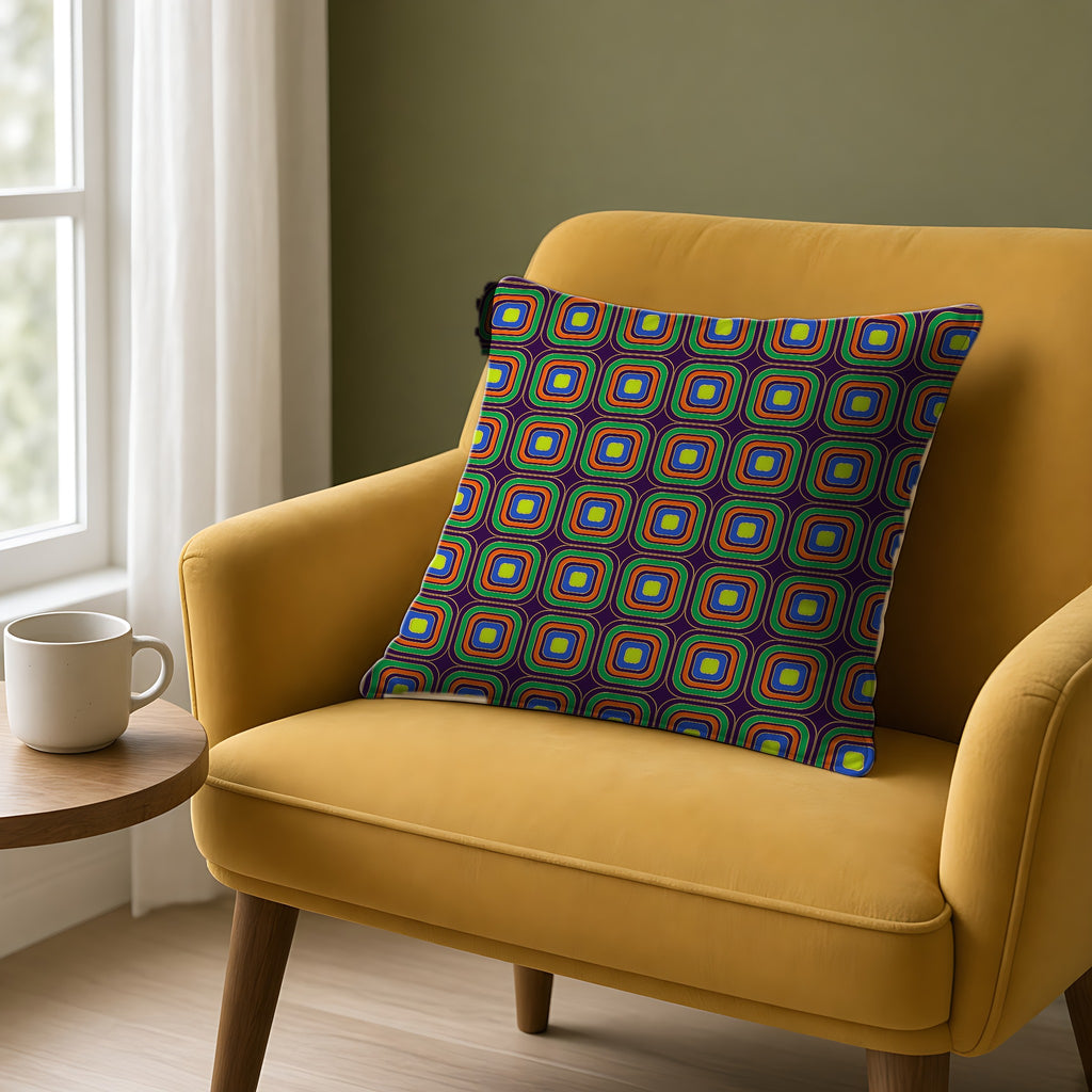 Op-Deco Nested Squares Faux Suede Cushion on a mustard armchair by a window