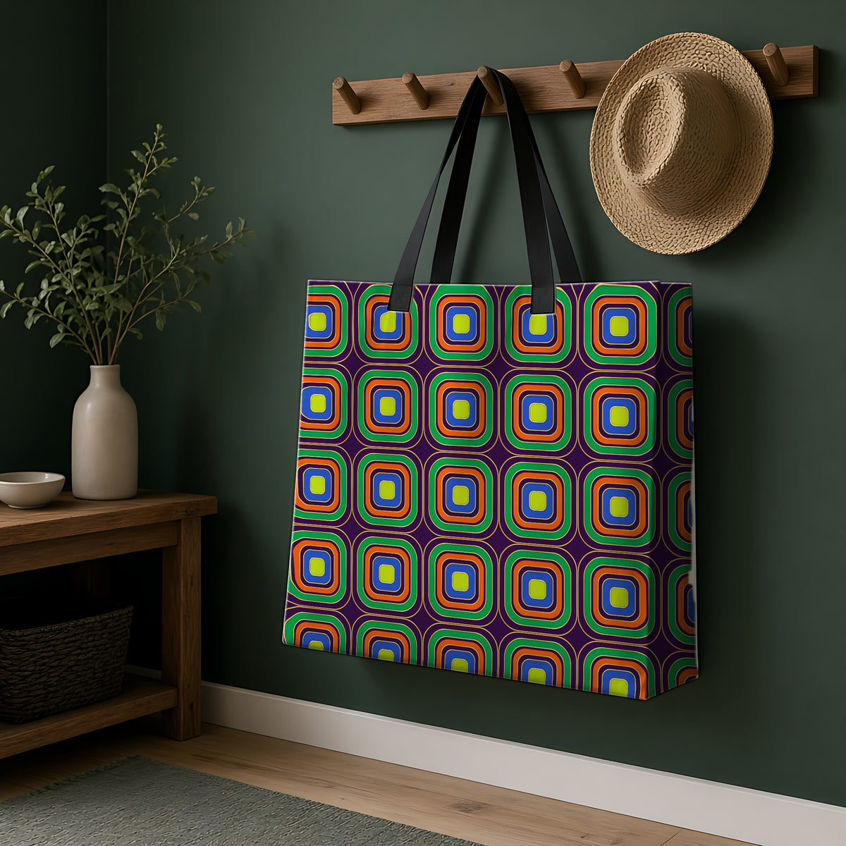 Op-Deco Nested Squares Weekender Tote Bag hanging on a peg rail in a green hallway