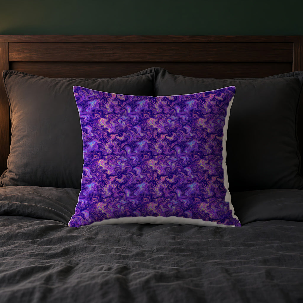 Ultraviolet Marble Swirl Faux Suede Cushion on a bed with charcoal bedding