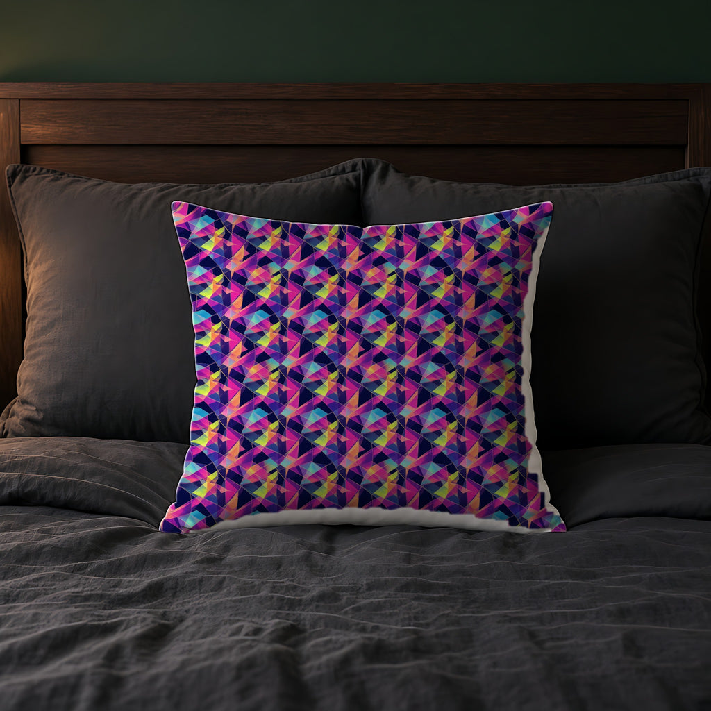 Prism Shard Cubist Faux Suede Cushion on a bed with charcoal bedding