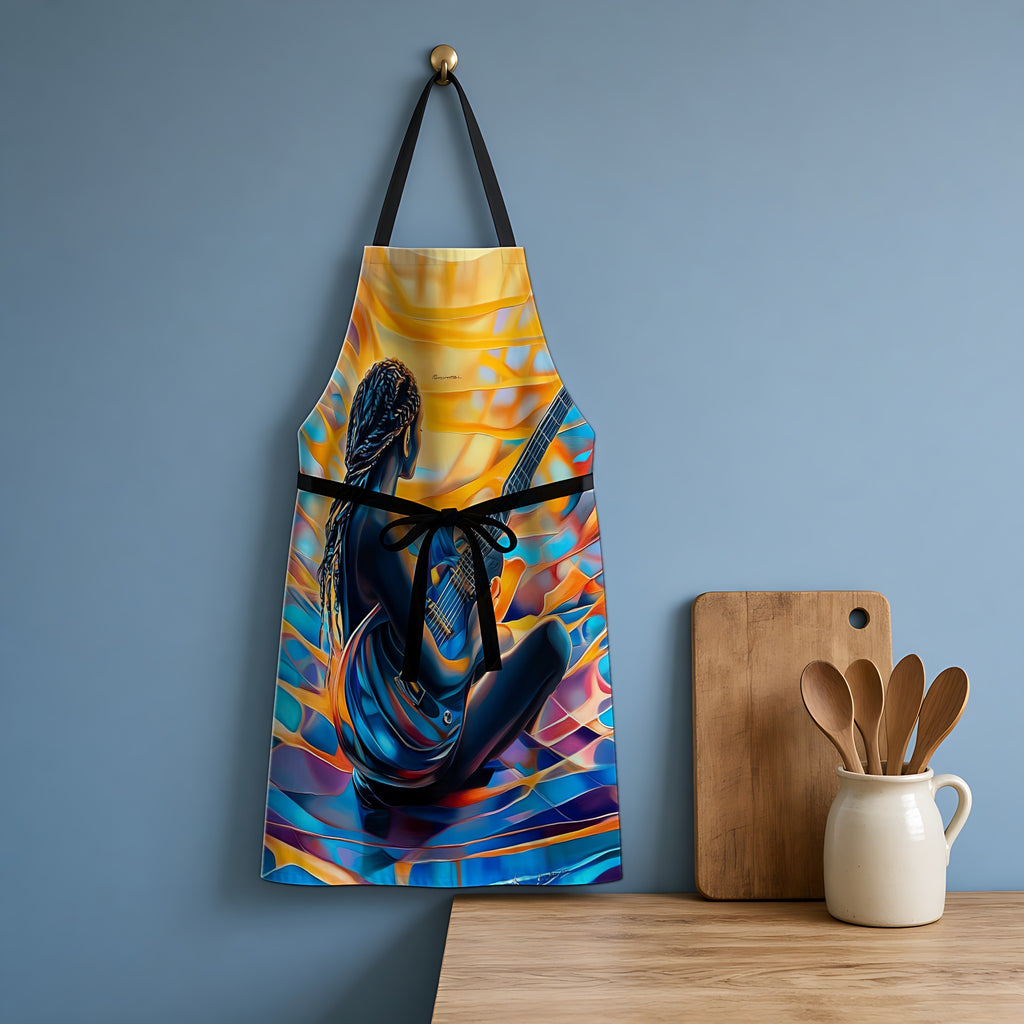 Guitar Dreamer Apron hanging in a blue kitchen