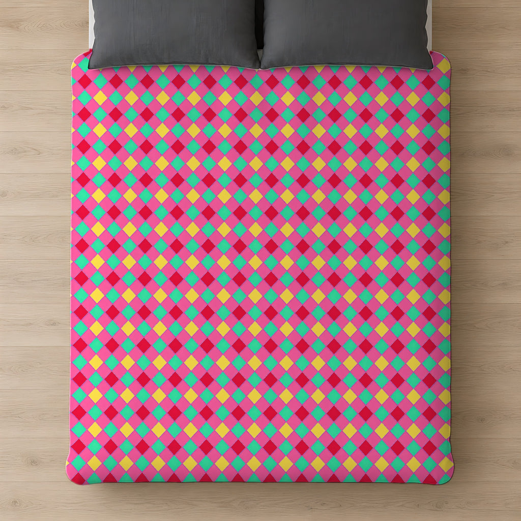 Jewel Harlequin Check Cotton Duvet Cover on a bed, seen from above