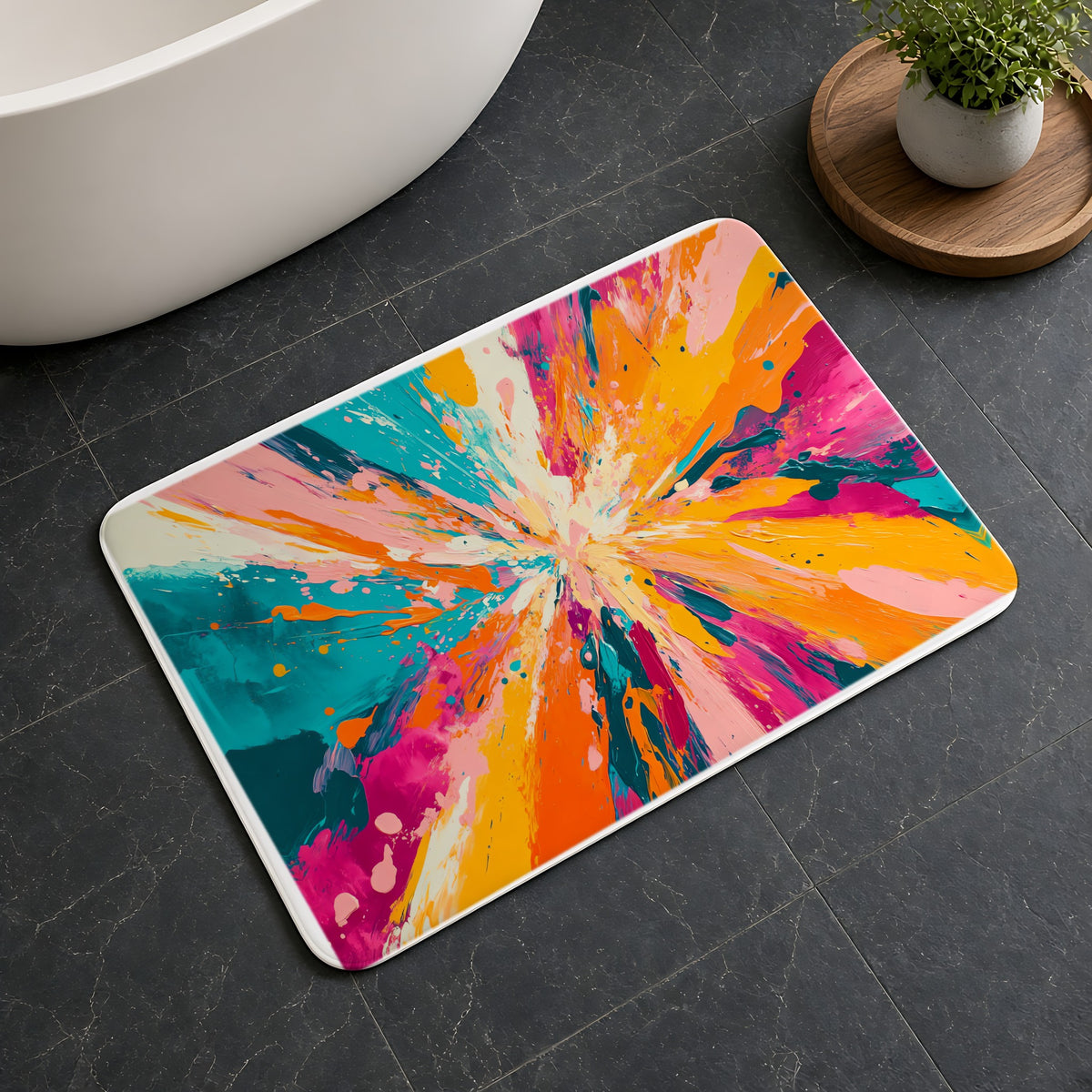 Colour Burst Explosion Bath Mat on a dark slate floor beside a bath