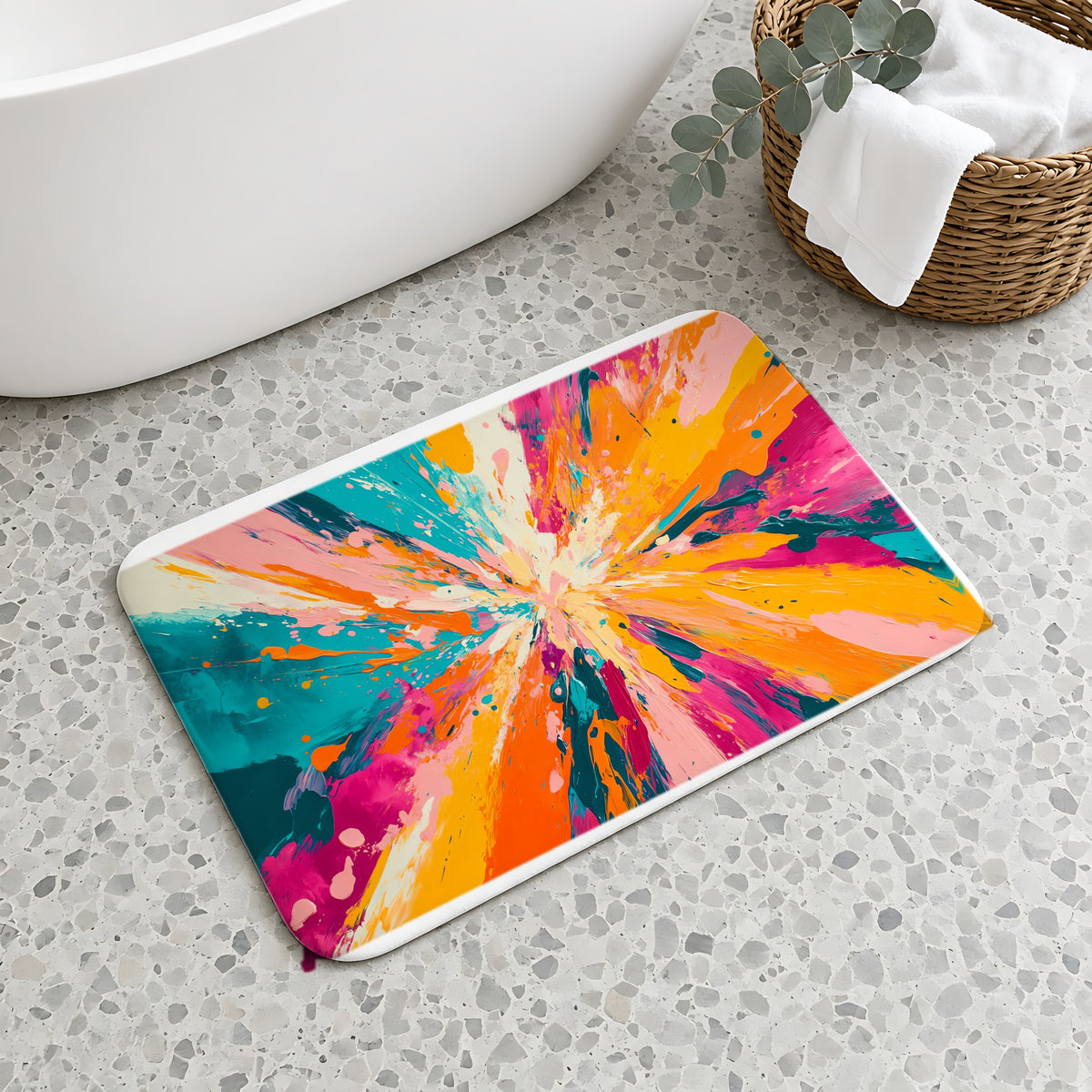 Colour Burst Explosion Bath Mat on a terrazzo floor beside a freestanding bath