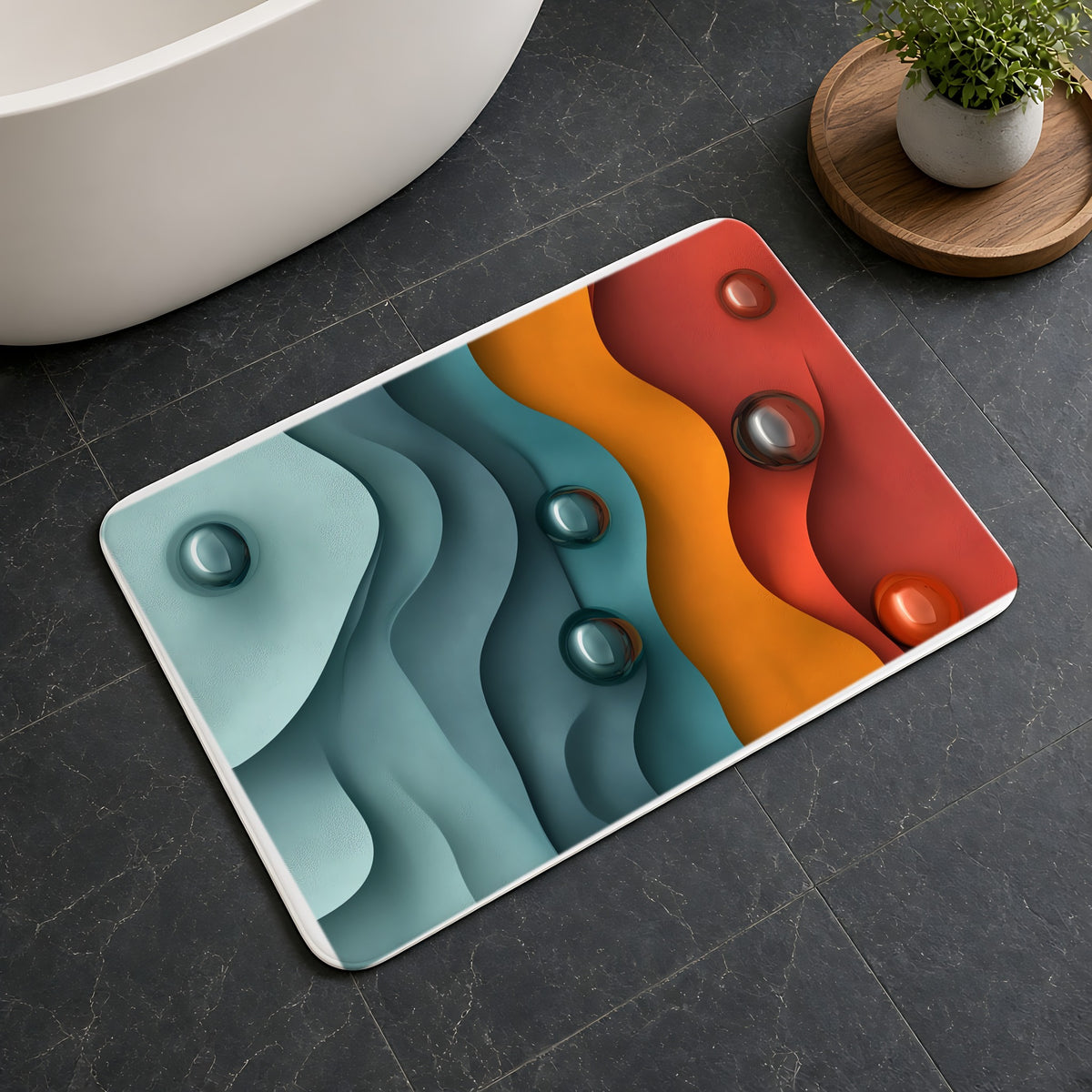 Teal Coral Waves Bath Mat on a dark slate floor beside a bath