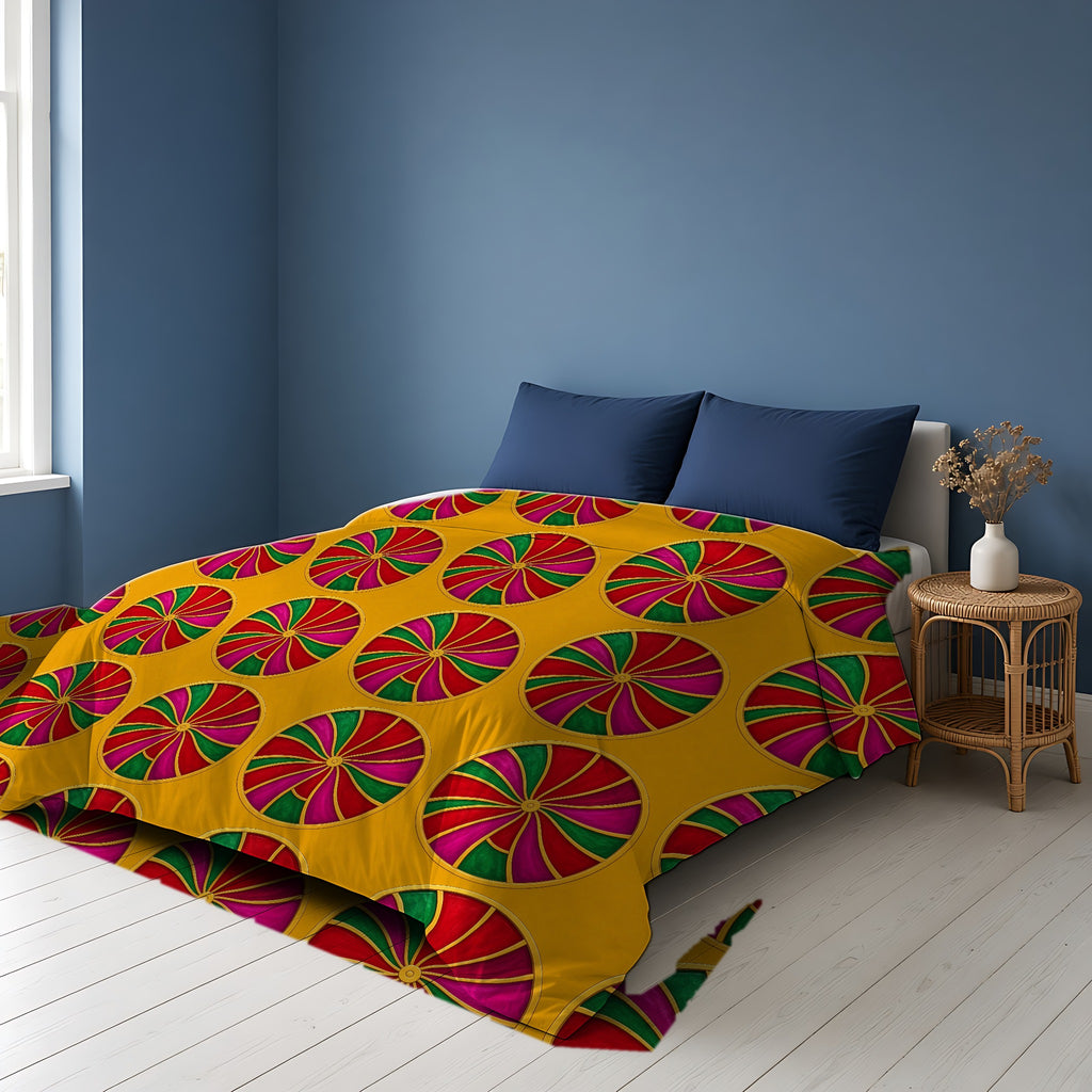 Grand Kaleido Jewel Wheels Comforter on a bed in a Scandinavian blue bedroom