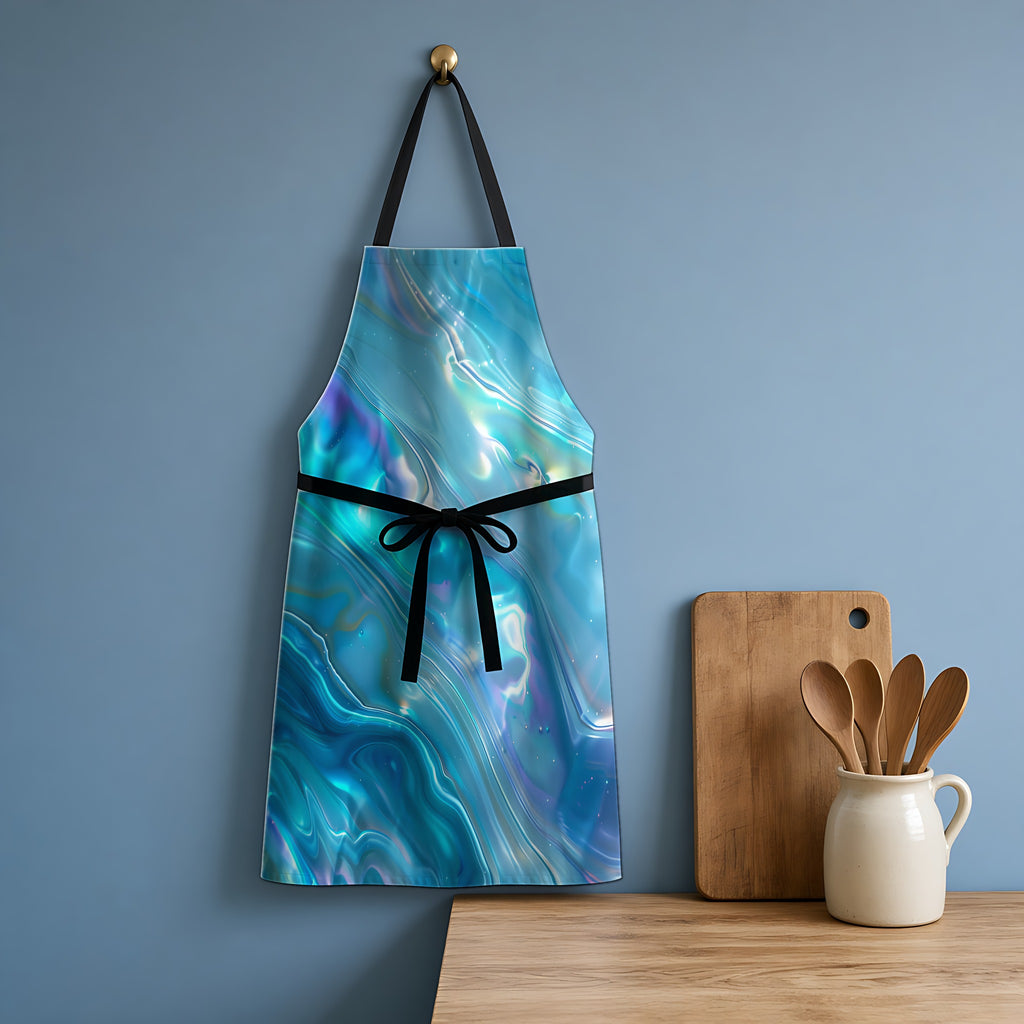 Aqua Holographic Ripple Apron hanging in a blue kitchen
