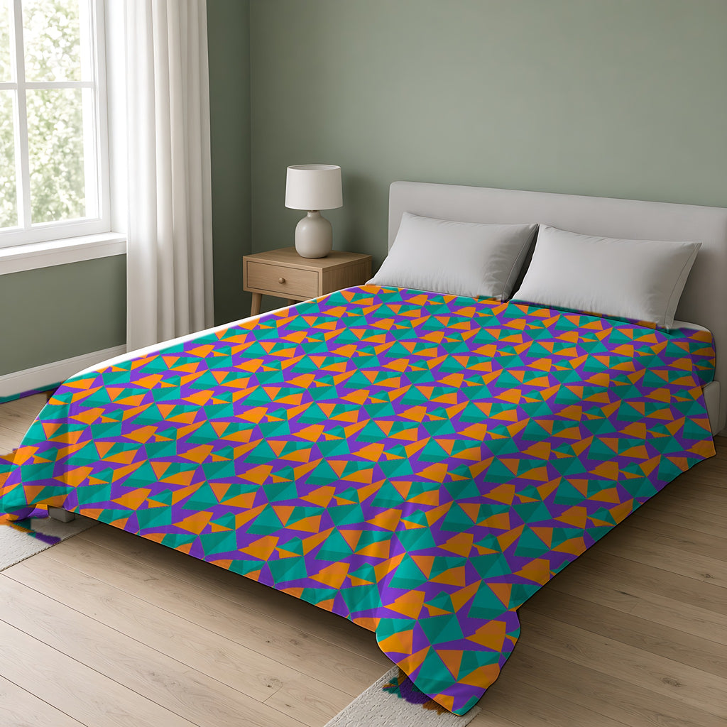 Faceted Gold Panels Cotton Duvet Cover on a double bed in a bright sage-green bedroom
