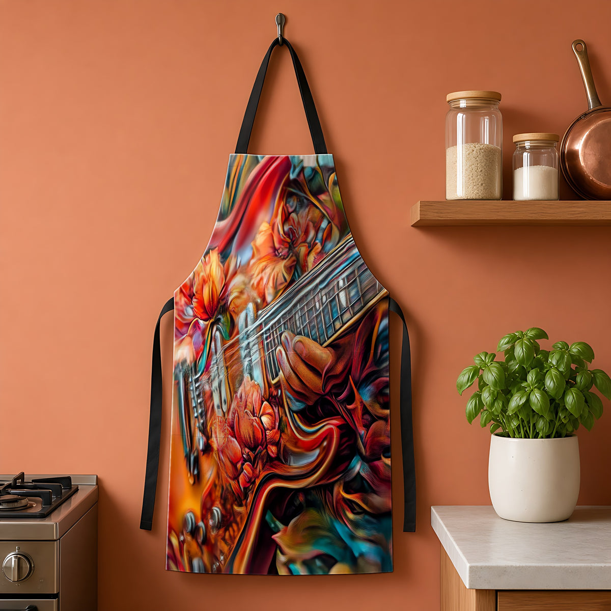 Floral Rock Guitar Apron hanging on a terracotta kitchen wall