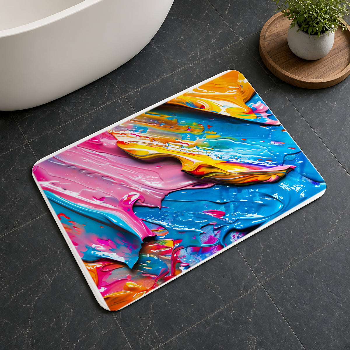 Vivid Paint Strokes Bath Mat on a dark slate floor beside a bath