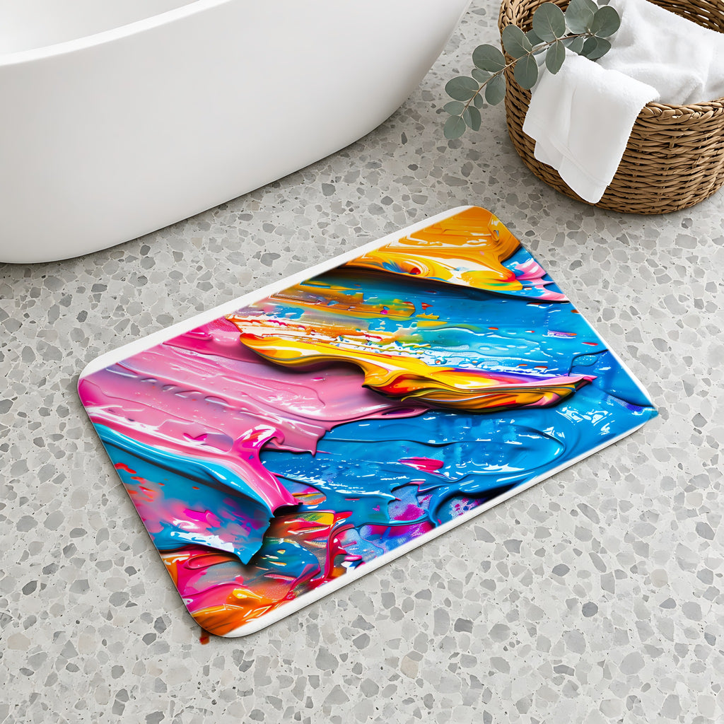 Vivid Paint Strokes Bath Mat on a terrazzo floor beside a freestanding bath