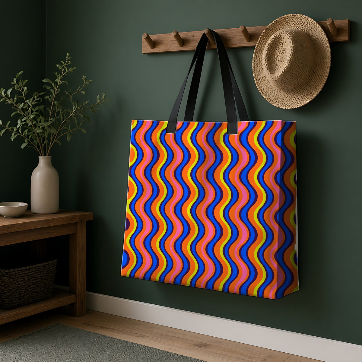 Warped Circus Stripes Weekender Tote Bag hanging on a peg rail in a green hallway