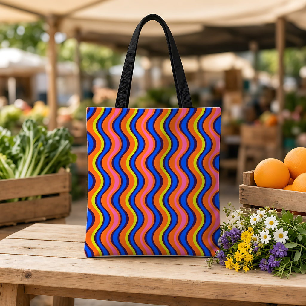 Warped Circus Stripes Weekender Tote Bag on a wooden bench at a farmers market