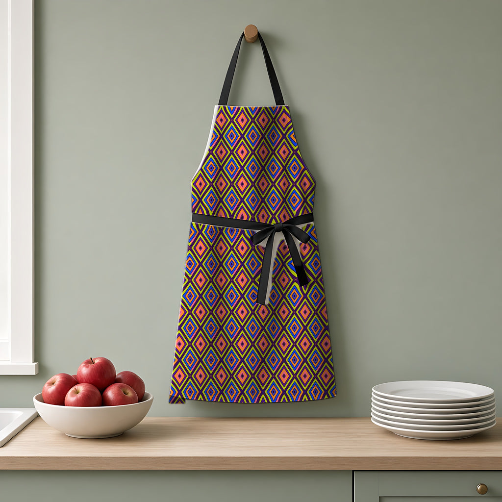 Diamond Ripples Apron hanging on a sage-green kitchen wall