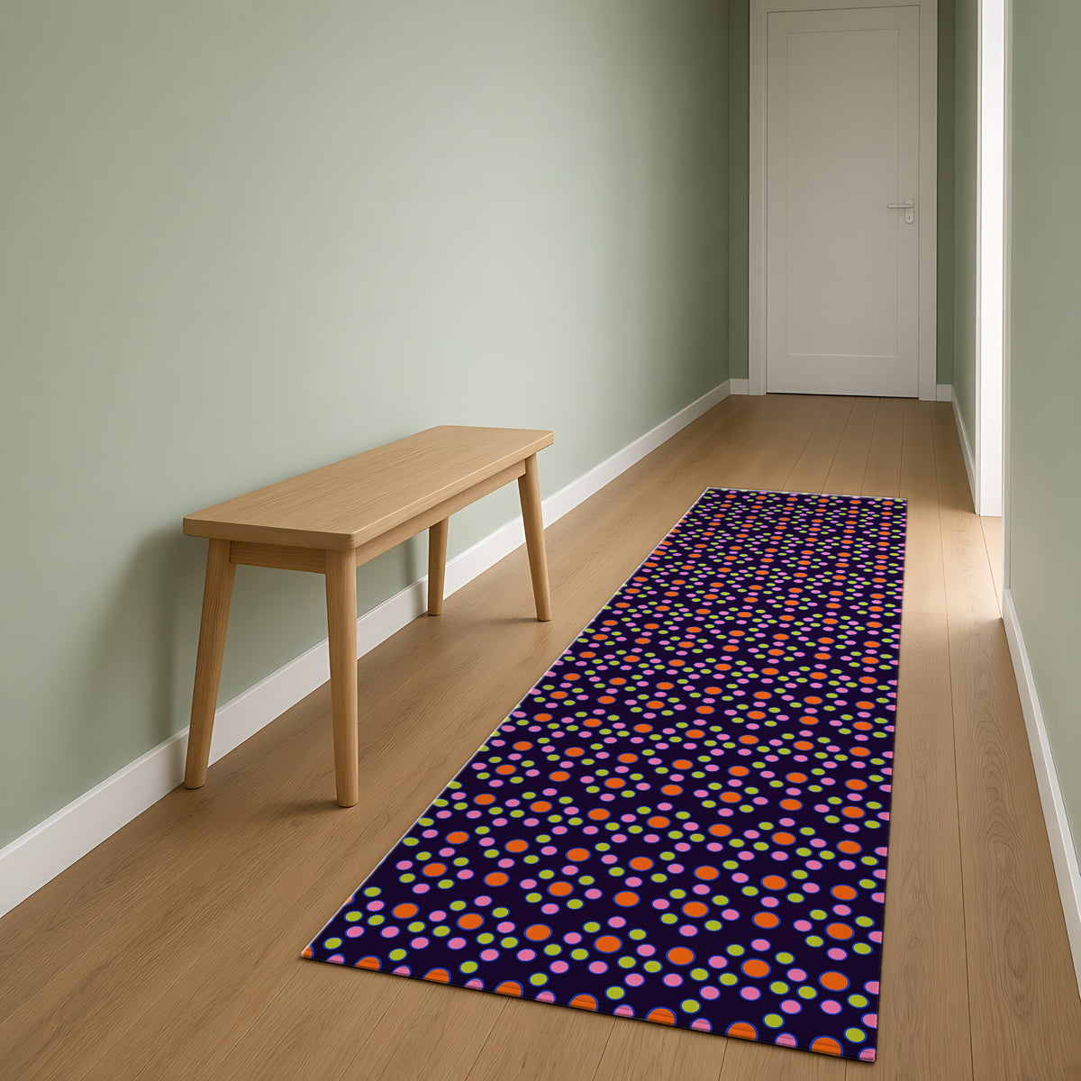 Bulging Dot Grid Outdoor Rug as a runner in a sage-green hallway