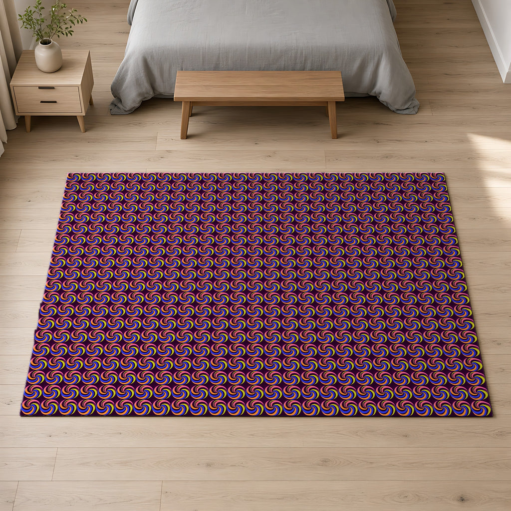 Spiral Stripe Swirls Outdoor Rug on a pale oak floor in a calm bedroom