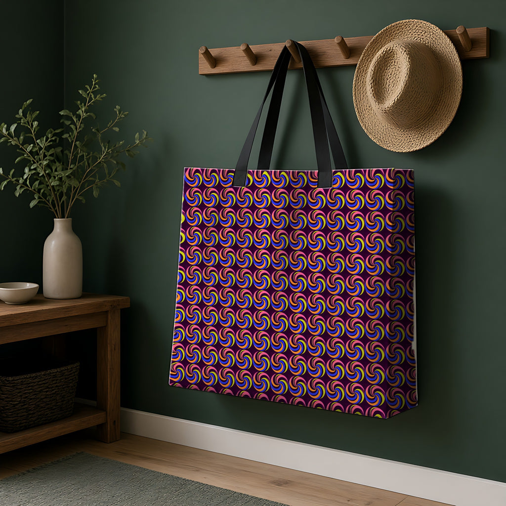 Spiral Stripe Swirls Weekender Tote Bag hanging on a peg rail in a green hallway