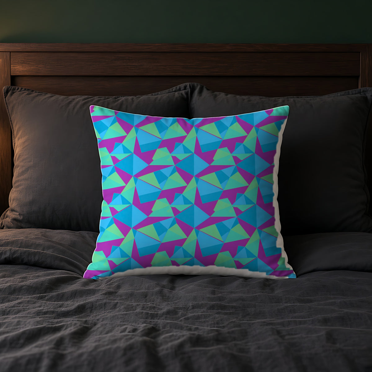 Faceted Panels Faux Suede Cushion on a bed with charcoal bedding