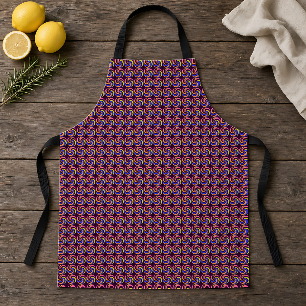 Spiral Stripe Swirls Apron laid flat on a rustic wooden table