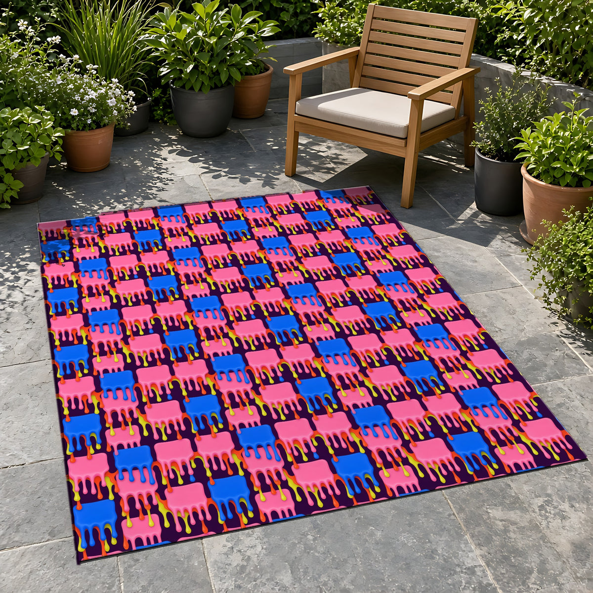 Melting Checkerboard Outdoor Rug on a stone patio with potted plants