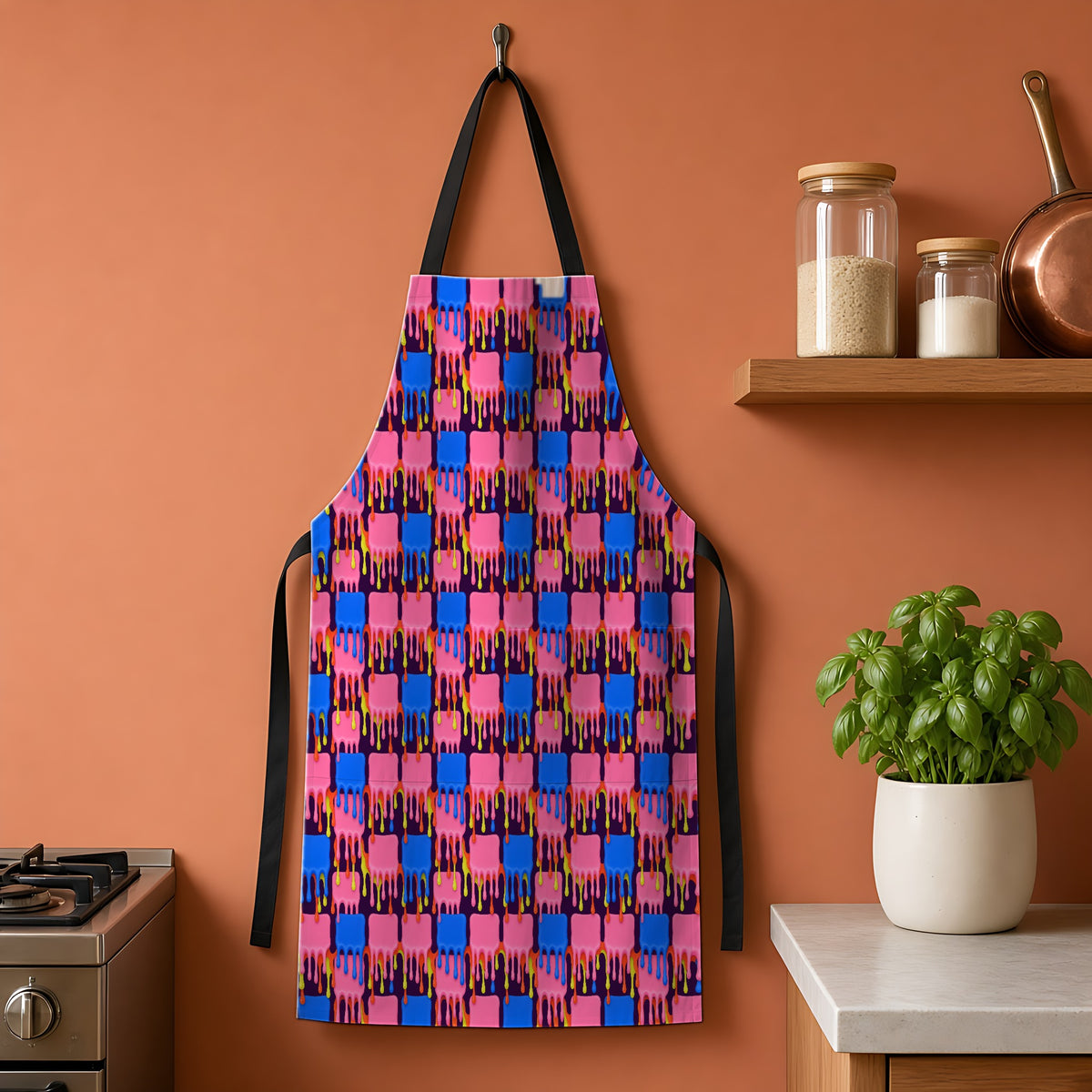 Melting Checkerboard Apron hanging on a terracotta kitchen wall