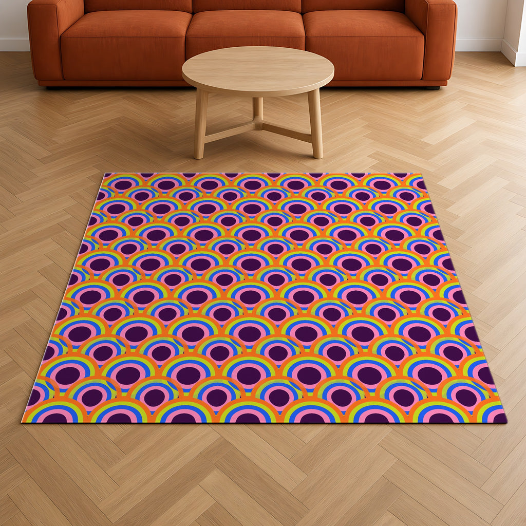 Pop Op Circles Outdoor Rug on a herringbone wood floor in a living room