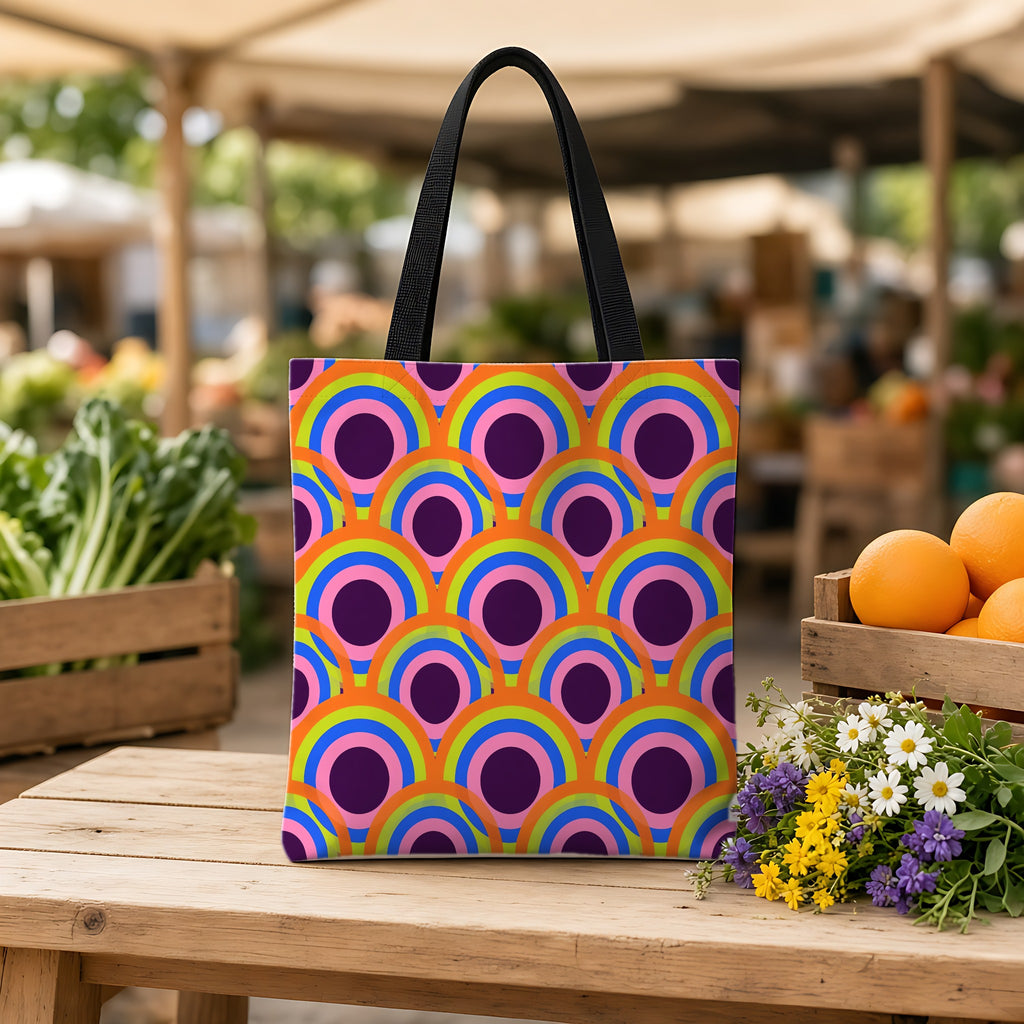 Pop Op Circles Weekender Tote Bag on a wooden bench at a farmers market