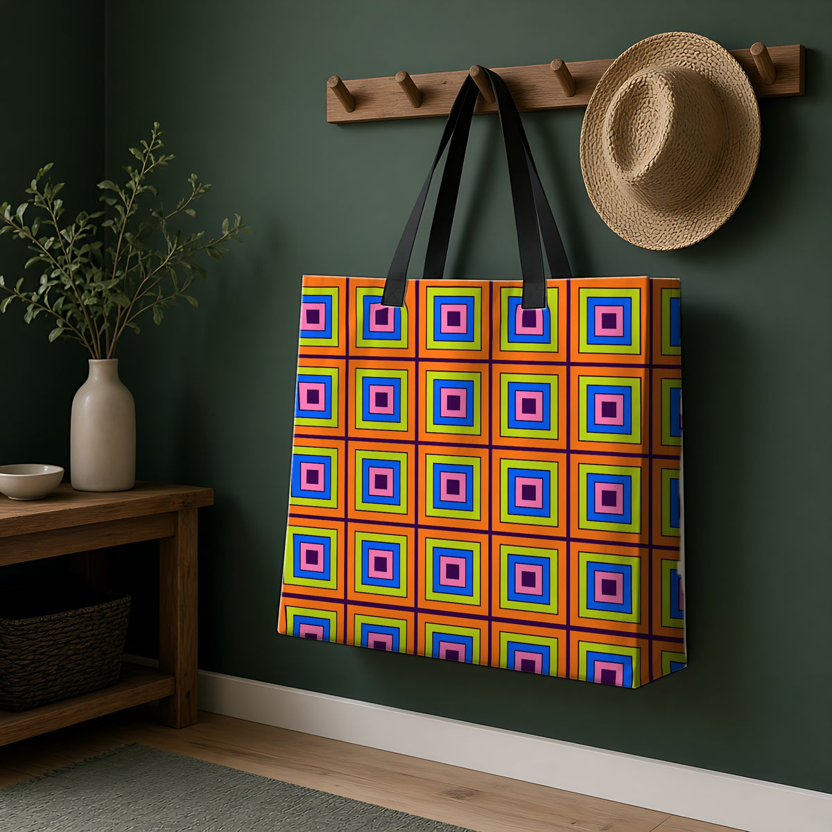 Concentric Square Pop Weekender Tote Bag hanging on a peg rail in a green hallway