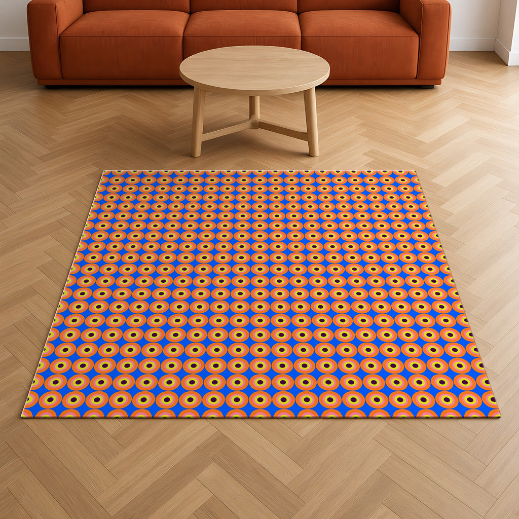 Pop Target Dots Outdoor Rug on a herringbone wood floor in a living room