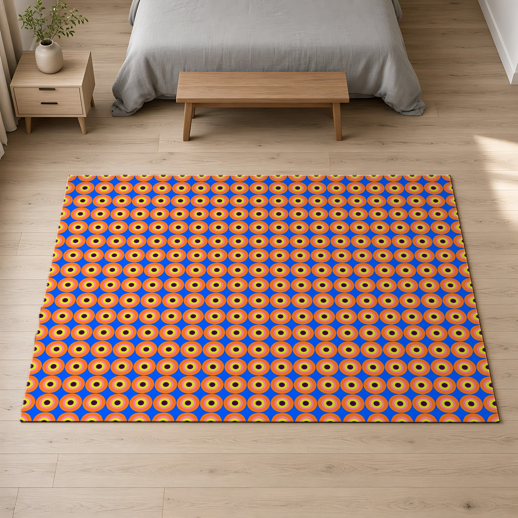 Pop Target Dots Outdoor Rug on a pale oak floor in a calm bedroom