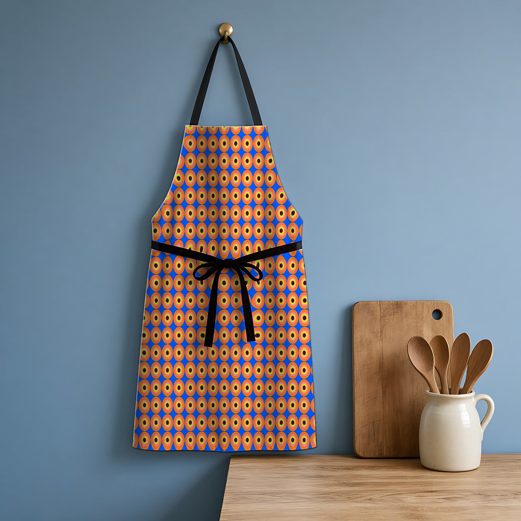 Pop Target Dots Apron hanging in a blue kitchen