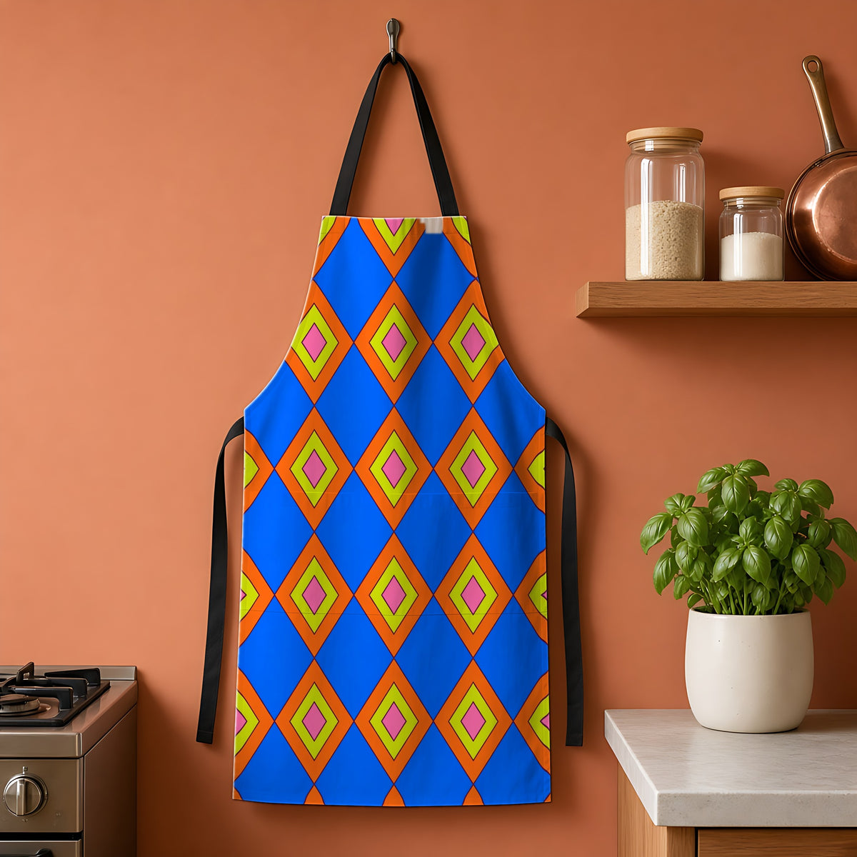 Pop Diamond Checks Apron hanging on a terracotta kitchen wall