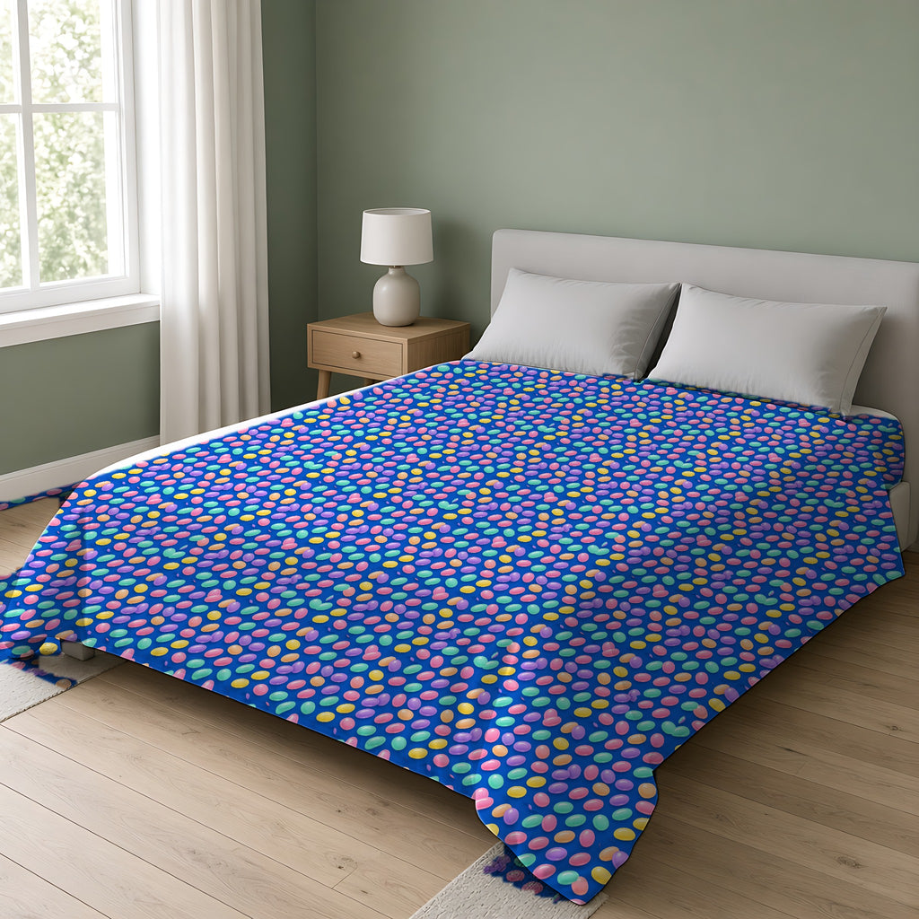 Jelly Bean Scatter Cotton Duvet Cover on a double bed in a bright sage-green bedroom