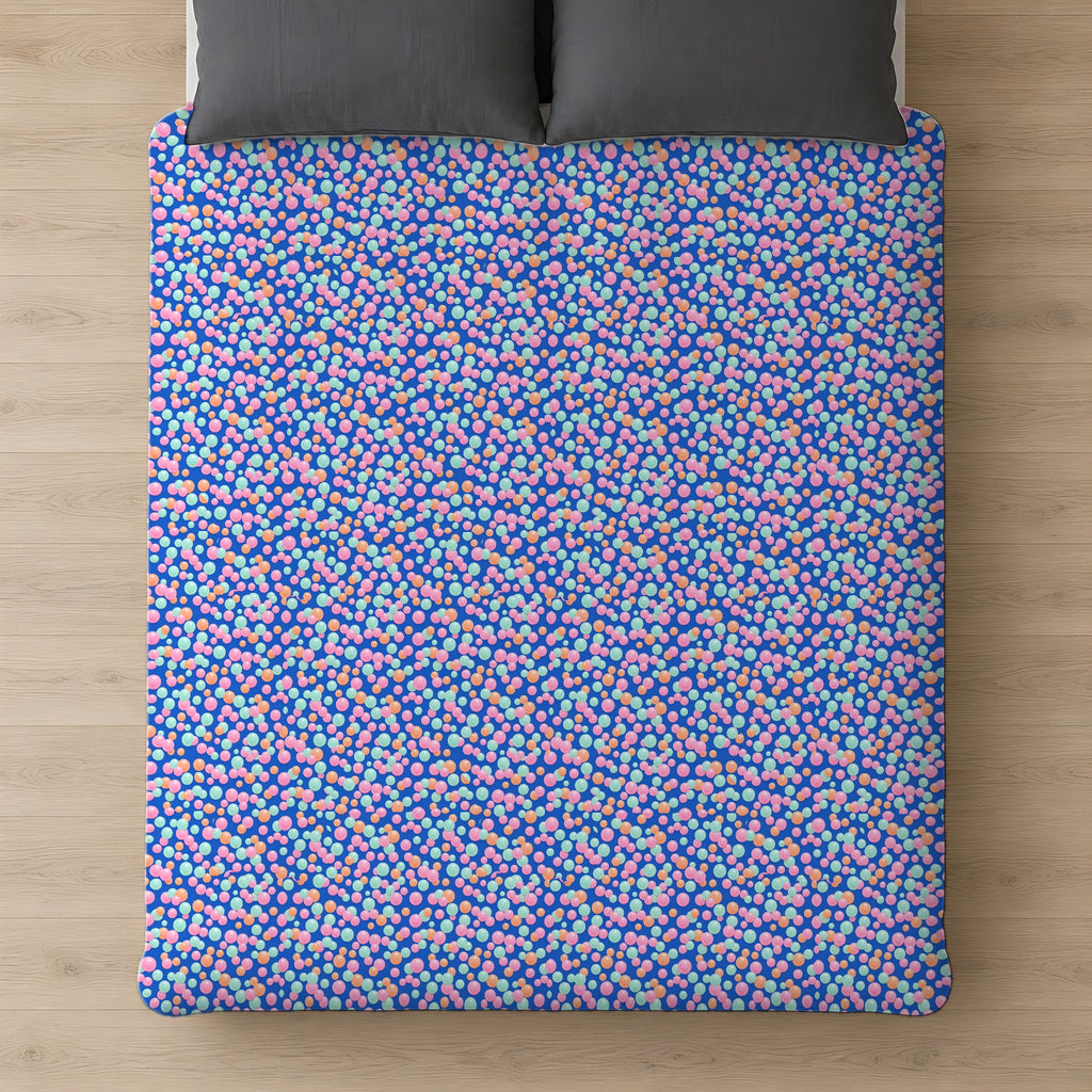 Bubble Cluster Pop Cotton Duvet Cover on a bed, seen from above