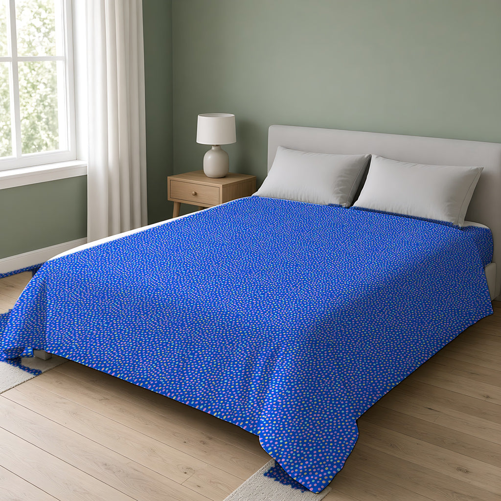 Sugar Confetti Cotton Duvet Cover on a double bed in a bright sage-green bedroom