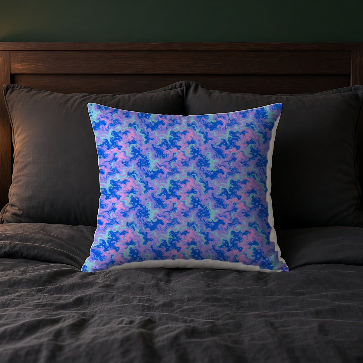 Candy Marble Veins Faux Suede Cushion on a bed with charcoal bedding