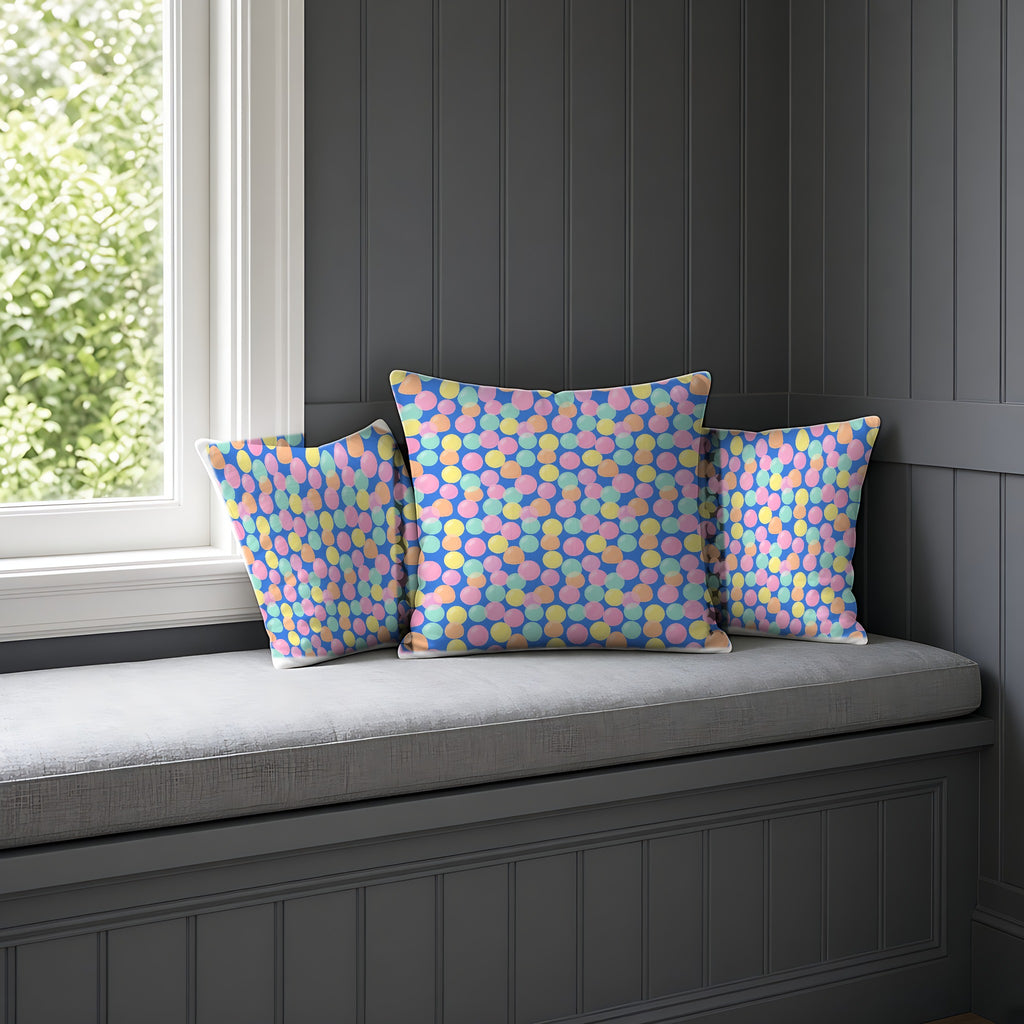 Gumdrop Orbs Faux Suede Cushion on a window seat