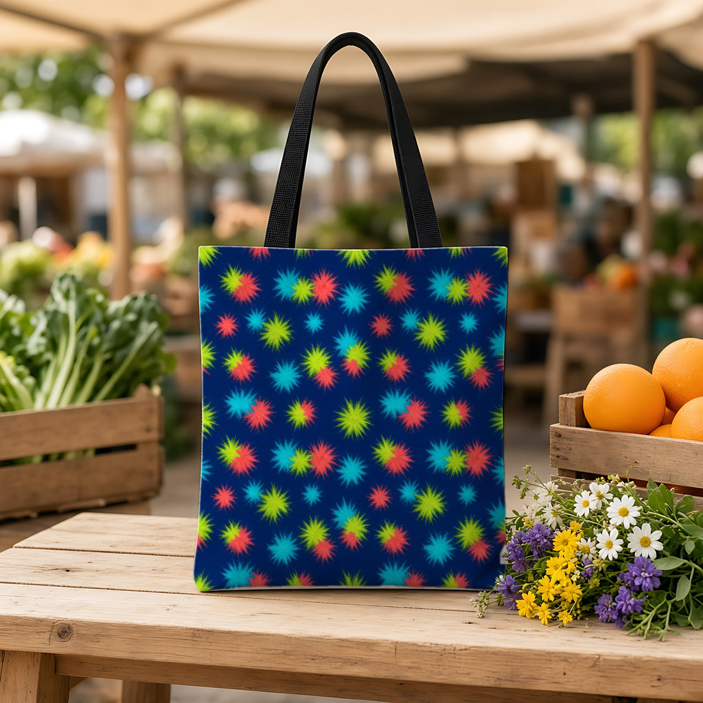 Dye Drop Spread Weekender Tote Bag on a wooden bench at a farmers market